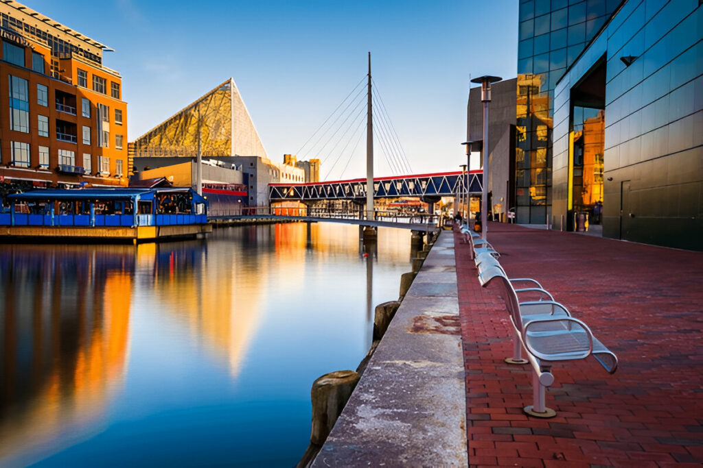 10 Of the Best East Coast Family Vacations and Destinations Giant Ferris wheel at National Harbor, Maryland, overlooking the waterfront – fun family vacation on the East Coast.