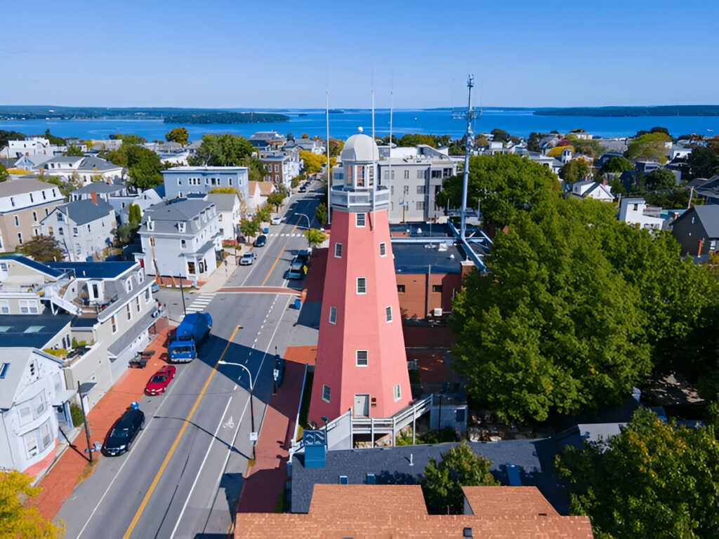 10 Of the Best East Coast Family Vacations and Destinations Scenic view of Portland Head Lighthouse on a sunny day iconic East Coast family travel destination