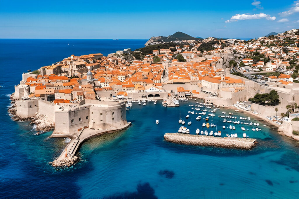 10 Magical Solo Travel Destinations To Fall In Love With The World Again Golden sunset over Dubrovnik’s ancient city walls and Adriatic Sea – stunning European coastal destination