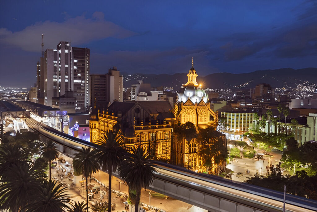 10 Magical Solo Travel Destinations To Fall In Love With The World Again Colorful cityscape of Medellín, Colombia with mountains – vibrant South American travel destination